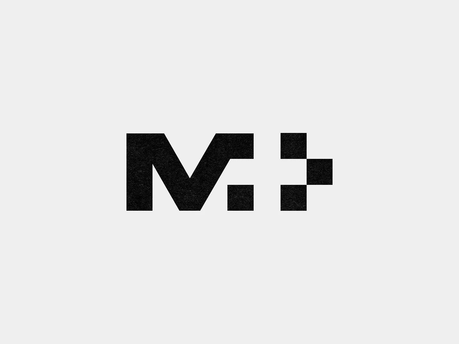 M+ hidden meaning negative space logo